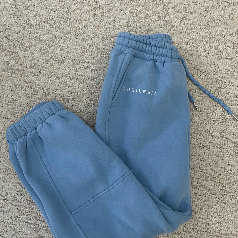 Woman’s blue sweat pants